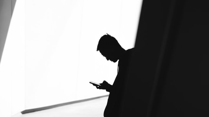 Man alone on mobile device